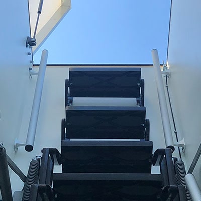Dolle trapdoor with high frame height and handrails 