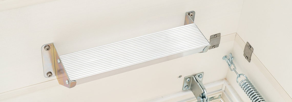 Closeup of step in flat roof hatch 